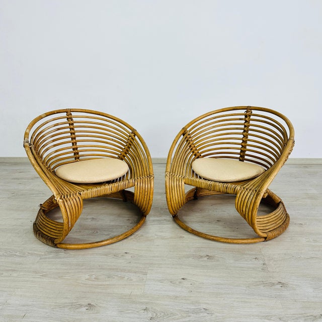 Dimensions: H 27.5” x W 28” x D 30.5” x SH 16”. Table: H 19.5” x W 31.5” Set of 3 Vintage Italian handmade rattan lounge...