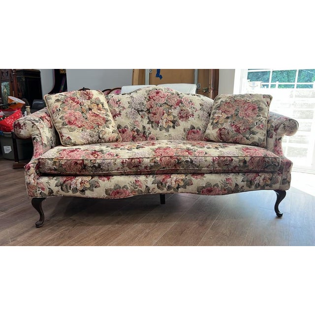 This elegant vintage humpback sofa made by Highland House Furniture features a graceful camelback silhouette upholstered...