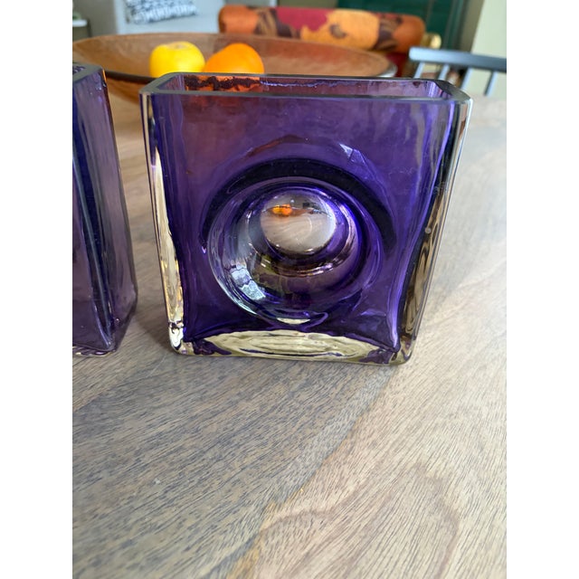 A striking pair of original Blenko "Bullseye" vases (Model #6944) in a deep, regal Amethyst glass. Designed by the...