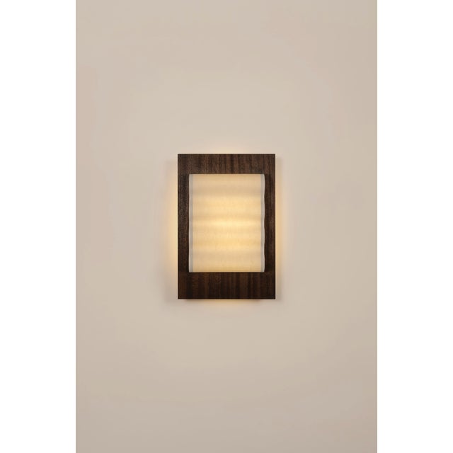 Introducting Frame, a collection of handcrafted wall sconces. Featuring a minimalist design, simple forms, and the subtle...