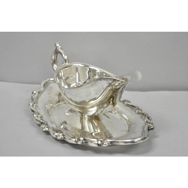 Vintage FB Rogers Silver Plated Victorian Gravy Sauce Boat w/ Attached Dish. Circa Mid 20th Century. Measurements: 4" H x...