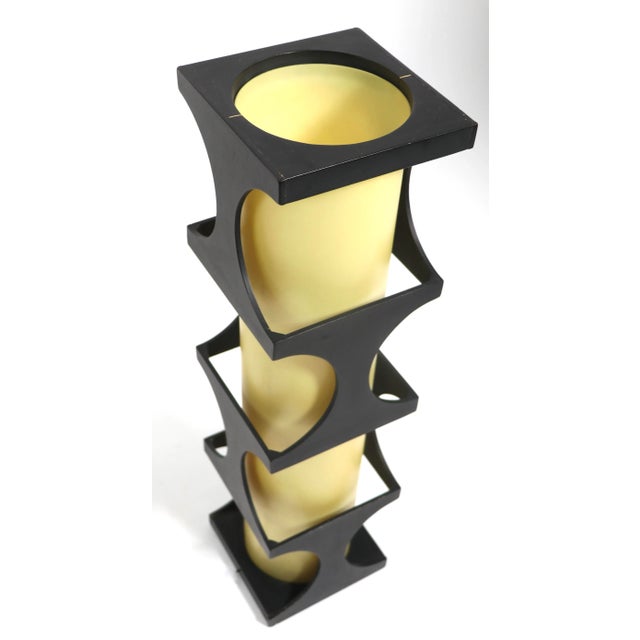Exceptional architectural totem form table lamp by Modeline. This example features a wood frame in original black paint...