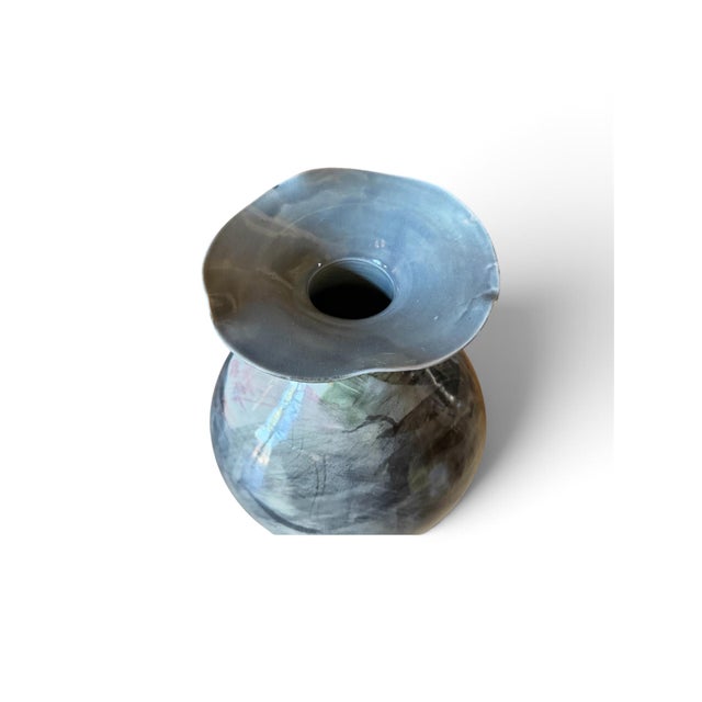 Striking studio pottery vase featuring a beautifully rounded, hand-crafted form and dramatic free-form wavy rim. The vase...