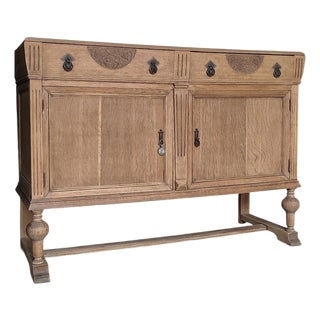Antique English Oak Sideboard With Bun Feet and Carved Details For Sale