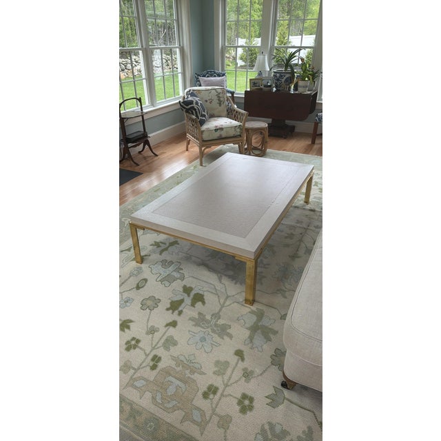 Beautiful designer coffee table with brass legs. Incredibly strong (and heavy). Love it, but doesn’t work in our new...