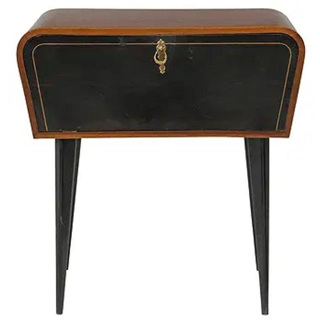 The Italian Mid Century Mahogany Side Table with Ebonized Front is a stylish and elegant piece of furniture. Made from...