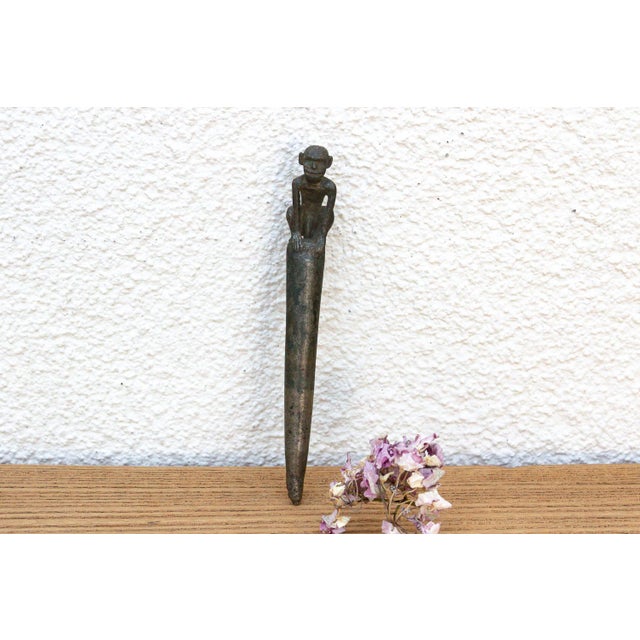 Hand-cast via ancient sand-mold casting methods, this fascinating piece represents an exceptional category of utilitarian...