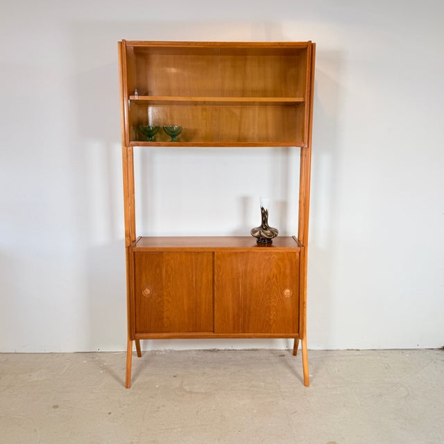 Characteristic Mid-century bookcase from the former Czechoslovakia. Designed by František Jirák for Tatra Nábytok in the...