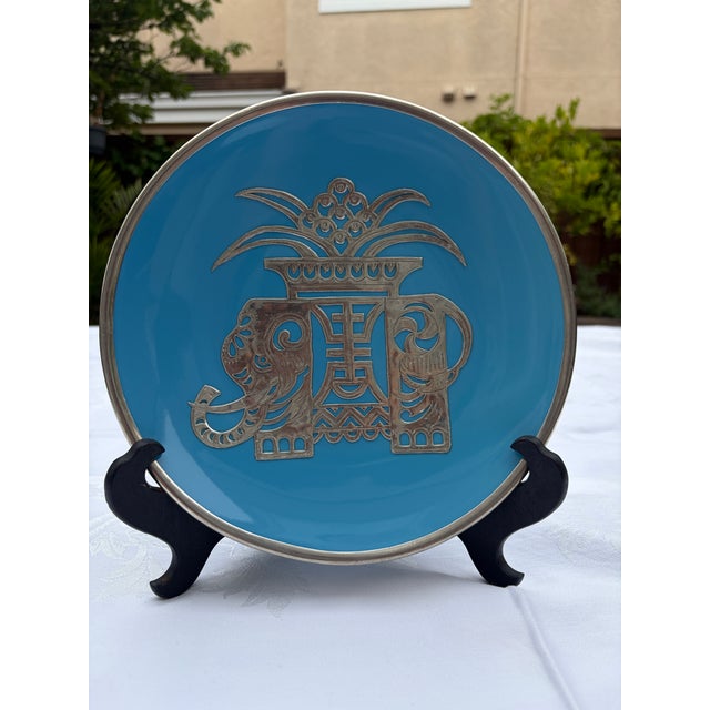 A striking vintage mid-century Asian export decorative mixed-media plate. This unique accent piece features a vibrant,...