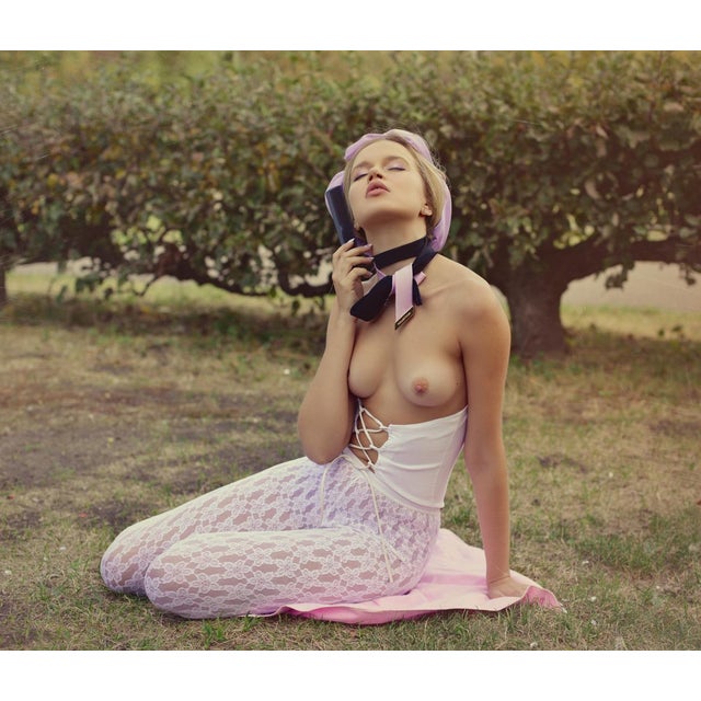 Lolita by Dasha and Mari Topless model poses in a garden, 2017. Limited edition print (edition size 1/30) 30x40" inches /...
