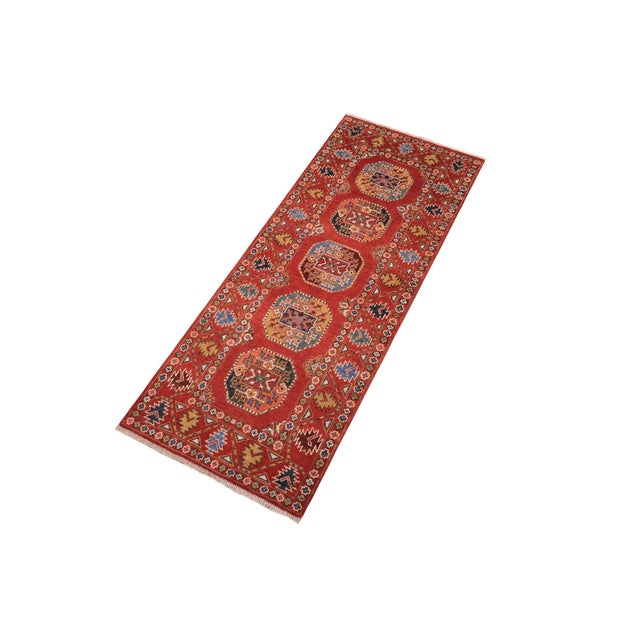 Enhance the ambiance of your home with this magnificent Persian-influenced Turkish hand-knotted rug made by skilled...