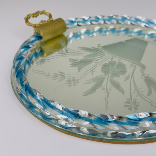 Amazing Murano tray made in Venice, Italy in the 1950s. The edge of the tray features a blue twisted glass border with...