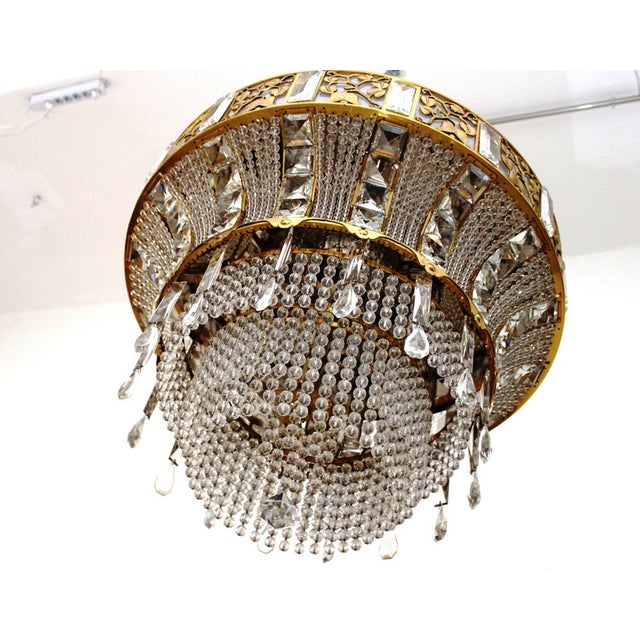Huge crystal chandelier, designed by Josef Hoffmann for the art exhibition in Cologne, 1914. This example was manufactured...