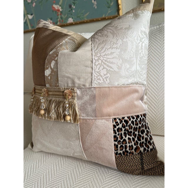 A pair of truly unique pillows, each one assembled in improvisational patchwork style from all-new luxury fabric remnants...