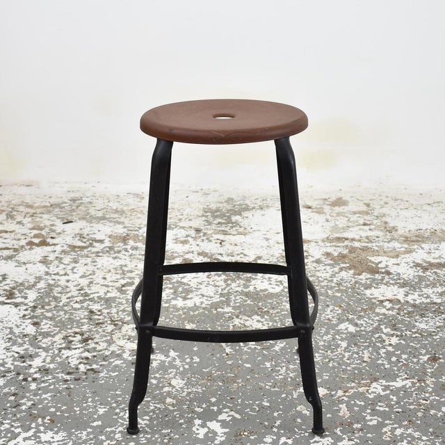 Vintage ‘Nicolle’ Style French Stool A tall industrial metal stool in the style of the iconic French ‘Nicolle’ factory...
