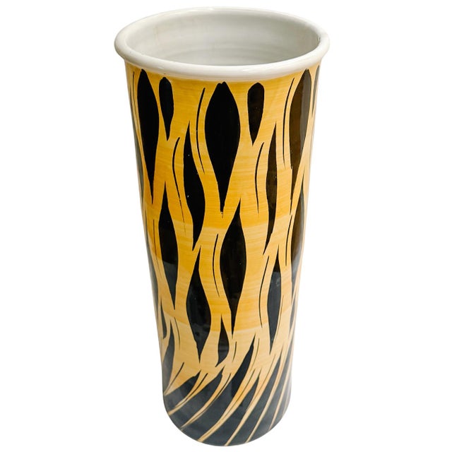 An exceptional mid-century modern vintage Italian ceramic umbrella stand featuring a striking, hand-painted abstract flame...