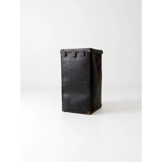 Vintage early 20th century vulcanized hardboard storage box with a tall, traveler-style silhouette and durable period...