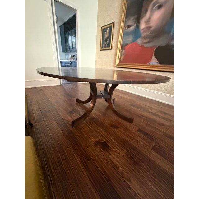 Therien Studio Workshops Round Dining Table – Sculptural Curved Base & Hand‑Finished Wood Top This exceptional round...