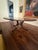 Therien Studio Workshops Round Dining Table – Sculptural Curved Base & Hand‑Finished Wood Top This exceptional round...
