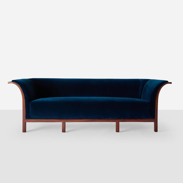 Description Mahogany Three-Seater Sofa Attributed to Frits Henningsen Denmark, c1930s Mahogany frame sofa with eight legs...