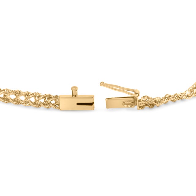 Indulge in the luxurious beauty of our 10K yellow gold basket weave rope chain bracelet, adorned with 5 stunning round-cut...