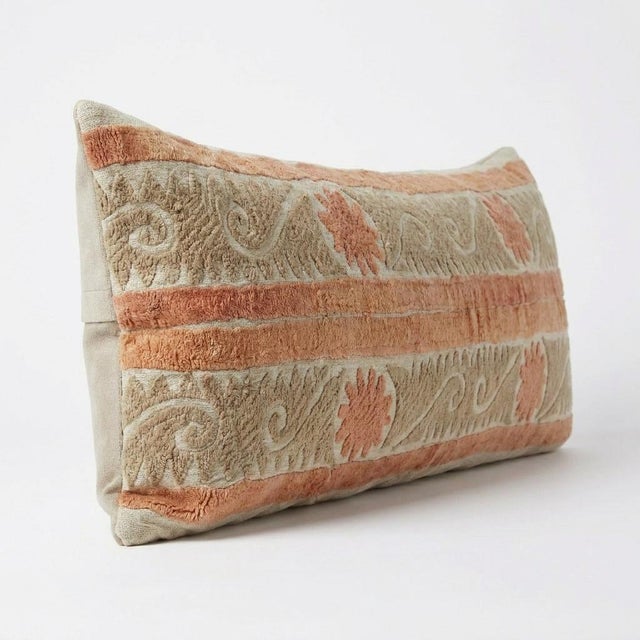 This beautiful 13'' x 38'' hand-embroidered Suzani pillow cover was made from authentic Uzbek cotton fabric. The intricate...