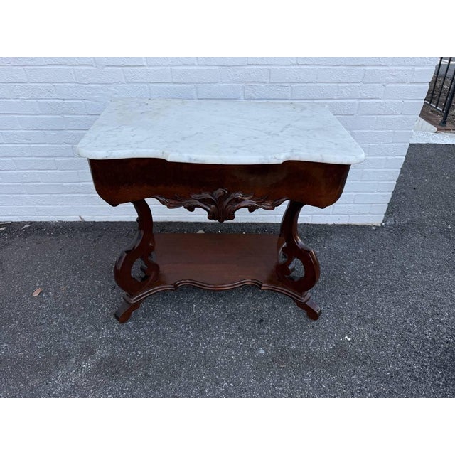 Antique American Rococo Revival Style Flame Mahogany Marble top 1 Drawer Console Table. Well carved , 2 Tiers, serpentine...