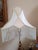 Illuminate your space with this dreamy silk beaded lampshade. It features an exquisite X-shaped pleated silk detail,...