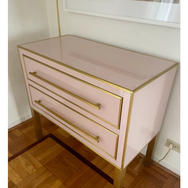 Aimee Painted Pink Glass Panel Dresser with Satin Brass Trim Self closing drawers. Pink interiors. Absolutely Stunning....