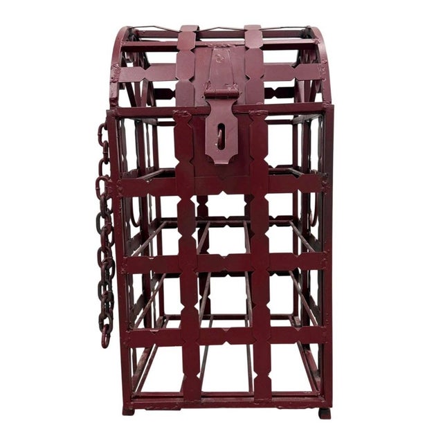 This antique-style wrought iron wine rack is beautifully crafted in a domed chest design, evoking classic French cellar...
