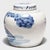 Loosely brushed with cobalt blue underglaze, this blue-and-white ginger jar is painted with a scene of scholars and young...