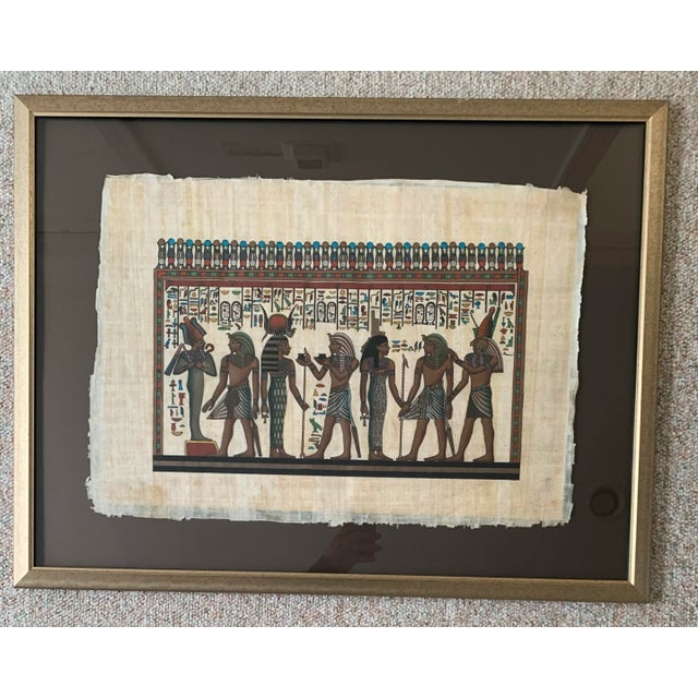 Egyptian Papyrus painting. With matting in gilt wood frame.