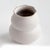 This handthrown vase has a weighty feel. Made with subtle ridges and a matte finish. The perfect little vase for a few...
