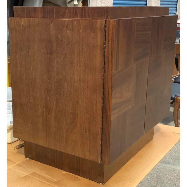 Mid century style walnut nightstand. Stand has been refinished. Stand has 2 doors. Stand also has a shelf. Excellent...