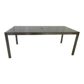 Attributed to Brueton Stainless Steel Dining Table with Gray Frosted Glass Top For Sale