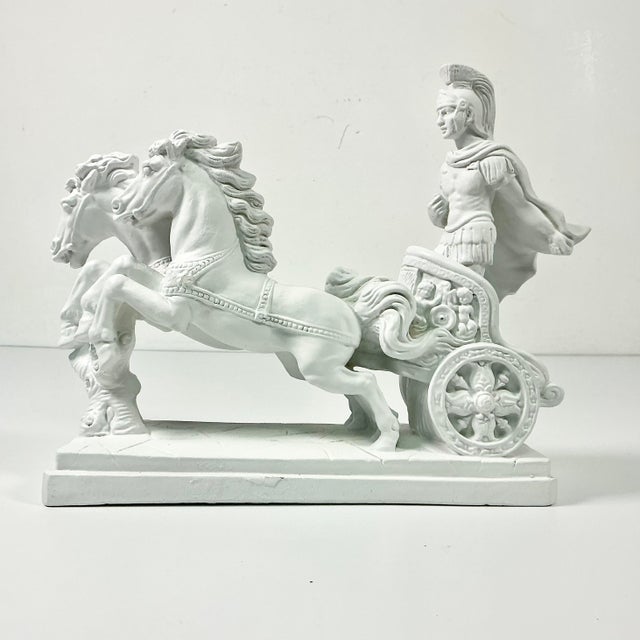 Vintage Home is pleased to offer this vintage plaster sculpture of a Roman Empire Hellenistic Charioteer driving a two-...