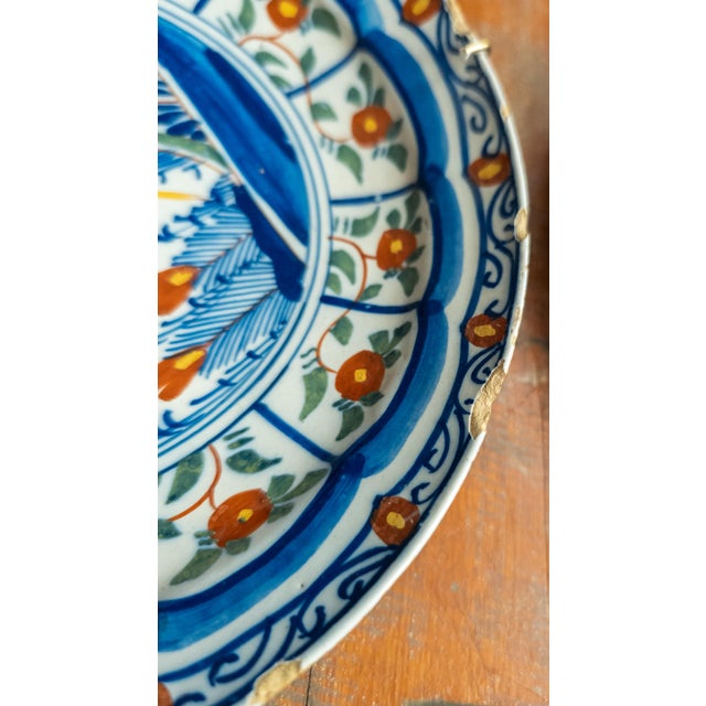 18th Century Pair of Dutch Delf Faience Polychrome Plates With Bird and Flowers For Sale - Image 11 of 14