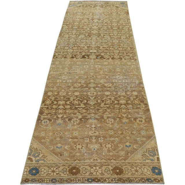 Hand-knotted with care using traditional rug-making techniques, this wool rug blends timeless craftsmanship with a modern...