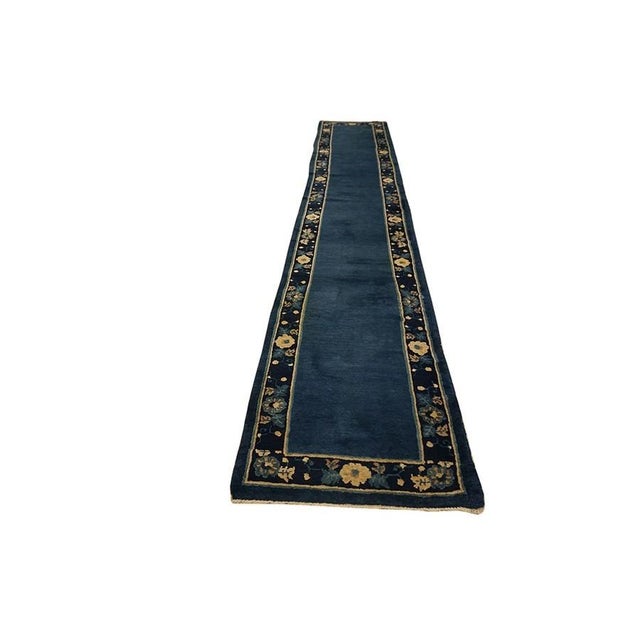 "This is a spectacular and exceptionally rare antique Chinese Peking wool runner, Hand-knotted circa 1920, this unique...