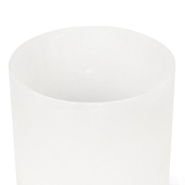 Add a touch of elegance to your home with this solid alabaster votive. Let the natural glow of a tealight candle...