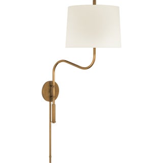 Thomas O'Brien for Visual Comfort Signature Canto Medium Swinging Wall Light in Hand-Rubbed Antique Brass with Linen Shade For Sale