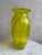 Uranium glass swirl vase – lime green – hand-blown – 30cm this striking uranium glass vase features a vivid lime green hue...