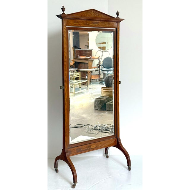 A beautiful large English cheval or full-length dressing mirror, in the Neo-Classical style, featuring a rectangular...
