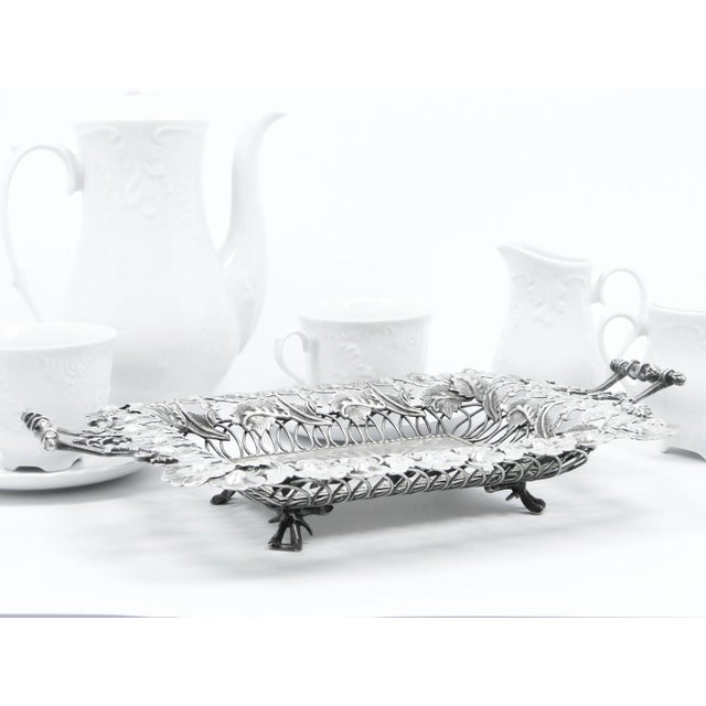 The fruit basket was produced in the Schiffers plate factory in Warsaw in the 80s of the nineteenth century. The object is...