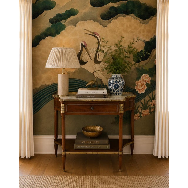 A refined 19th-century French Louis XVI style mahogany console table (or console desserte), perfect for an entryway,...