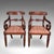 This is a pair of antique morning room elbow chairs. An English, mahogany lounge or reception hall seat, dating to the...