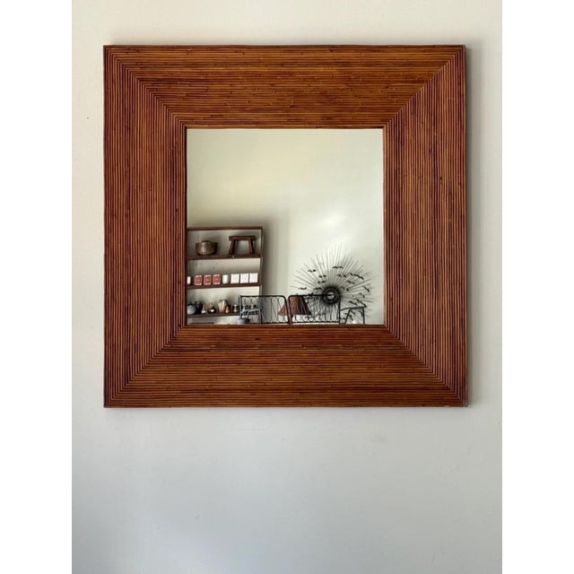 Large scale pencil reed mirror. 48” square x 2.5”D In excellent vintage condition.