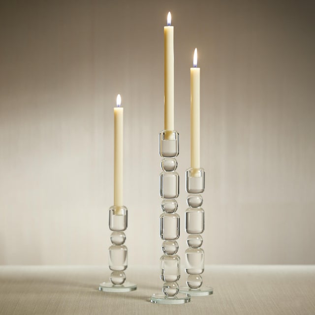 Place your favorite taper candle in this stacked crystal candleholder for a glamorous touch to any room. This beautiful...