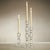 Place your favorite taper candle in this stacked crystal candleholder for a glamorous touch to any room. This beautiful...