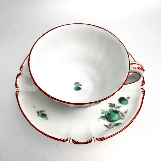 A set of rococo revival porcelain dessert service, entirely and exquistely hand enamel painted with floral motifs....